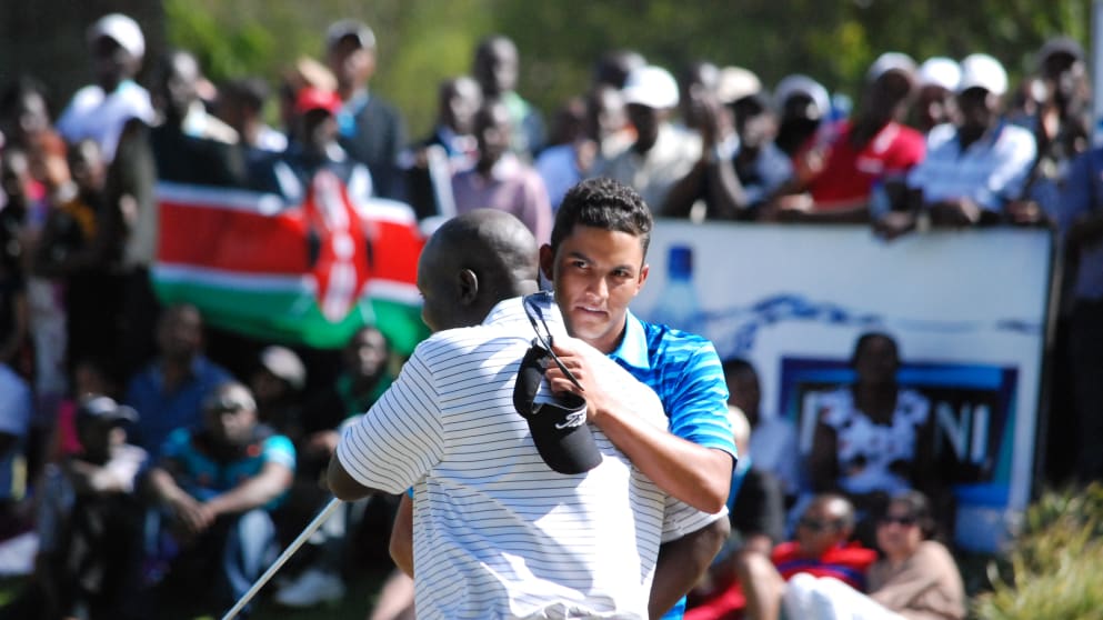 Greg Snow (facing camera) and Dismas Indiza shake hands after the final round of the Barclays Kenya Open (Thomas Mbuvi)