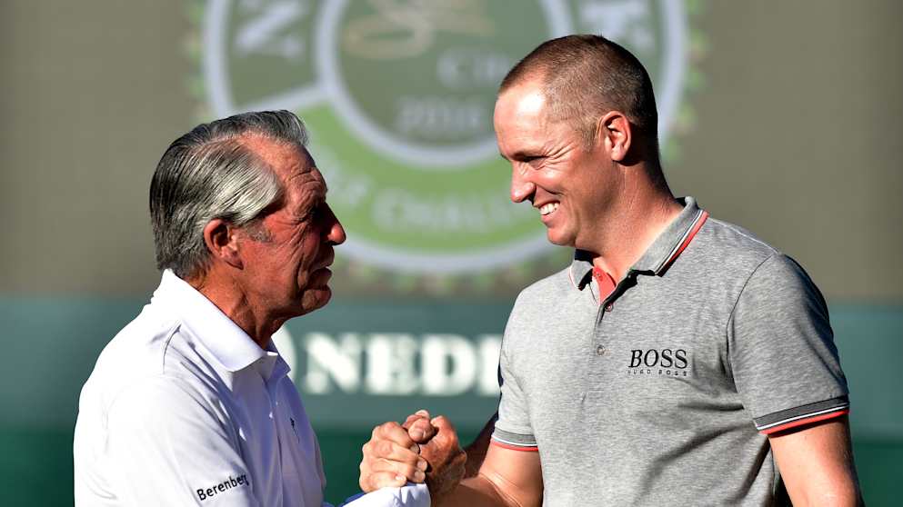 Alex Noren is congratulated by Gary Player at the 2016 Nedbank Golf Challenge