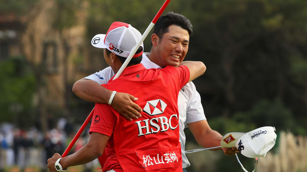 Hideki Matsuyama celebrates with his caddie in China