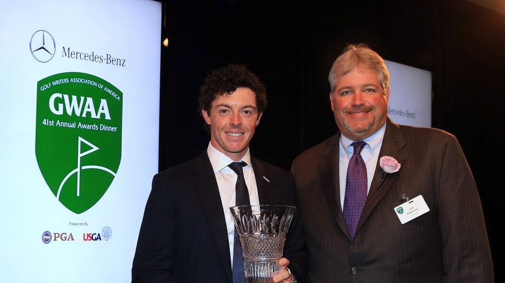 Rory McIlroy receives the 2012 Male Player of the Year Award from Jeff Babineau of Golf Week magazine during the 41st Annual Awards Dinner of the Golf Writers Association of America 
