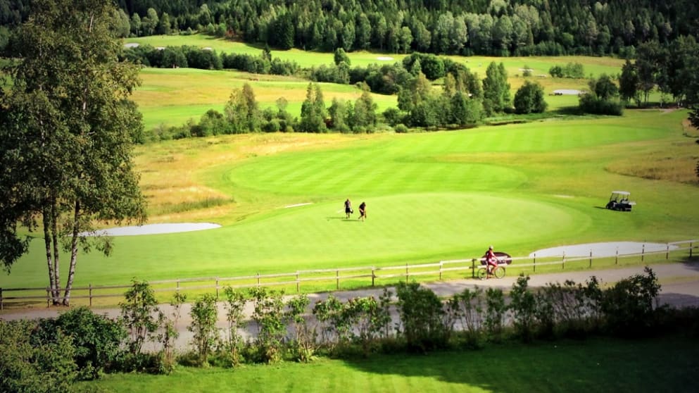 Losby green staff, who have come in for huge praise during this week's Norwegian Challenge, change the pins for the second round during day two