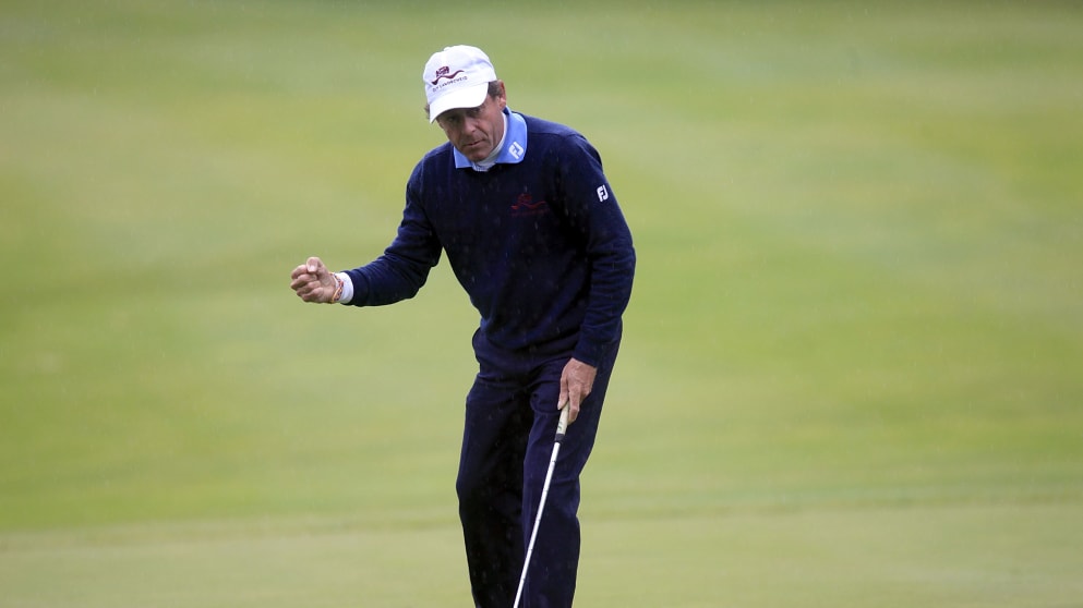 Simon P Brown celebrates birdie at 17