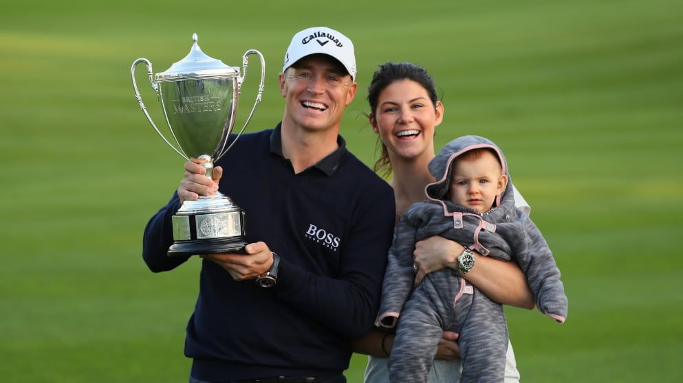 Alex Noren celebrates with his family