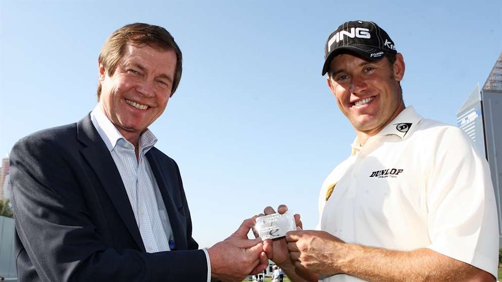 Lee Westwood recieves his Honorary Life Membership Card from Tour Chief Executive George O'Grady 