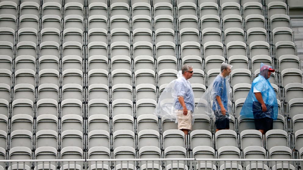 Fans during suspension of play on Saturday at Firestone