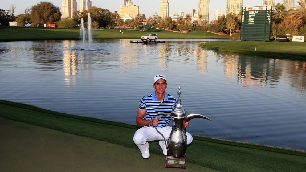 Rafa Cabrera Bello with the Omega Dubai Desert Classic trophy