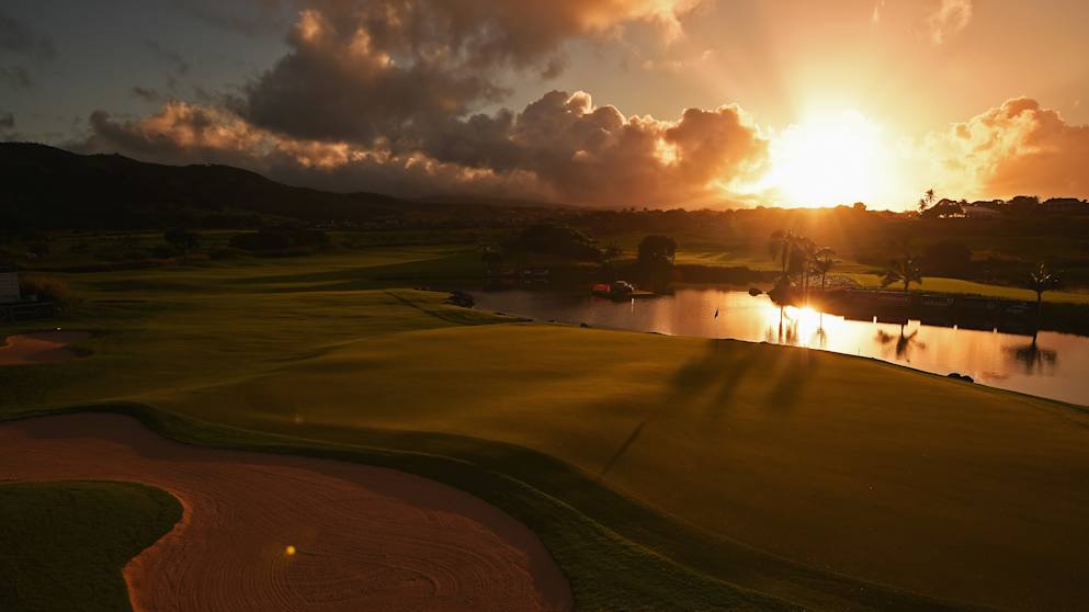 The sun rises over the 18th green before the start of the final round of the AfrAsia Bank Mauritius Open