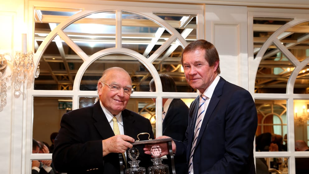  (L-R) Renton Laidlaw, President of the Association of Golf Writers, is presented with a retirement gift by George O'Grady (R), Chief Executive of The European Tour at The European Tour Race to Dubai Golfer of the Year Luncheon