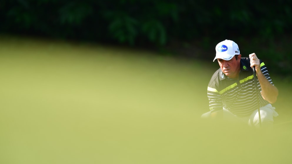 Scott Hend lines up a putt at the Maybank Championship