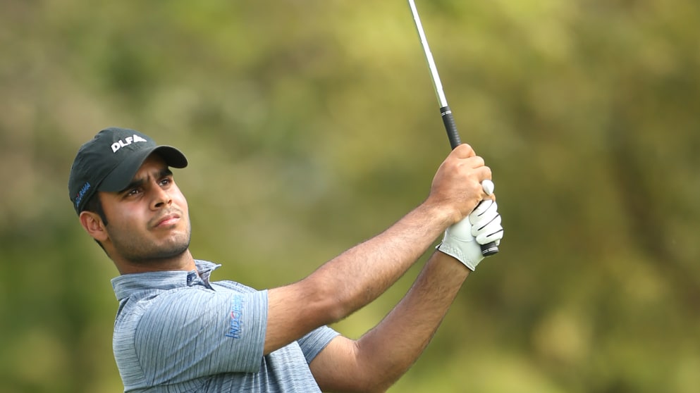 Shubankar Sharma of India plays a shot on the 18th hole during the second day