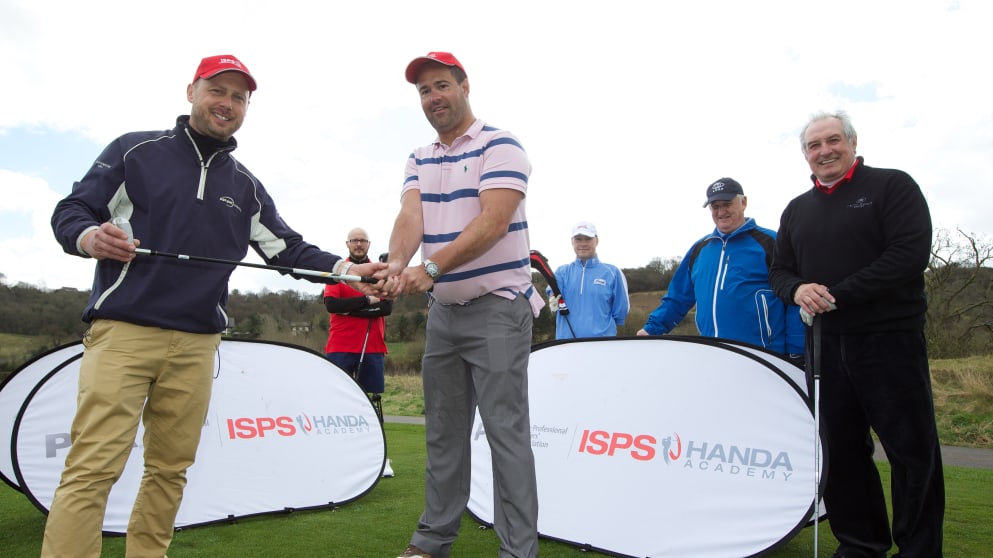 Paralympian, David Roberts (R), receives his first ever golf lesson off PGA Tutor, Mark Taylor (L) at Celtic Manor