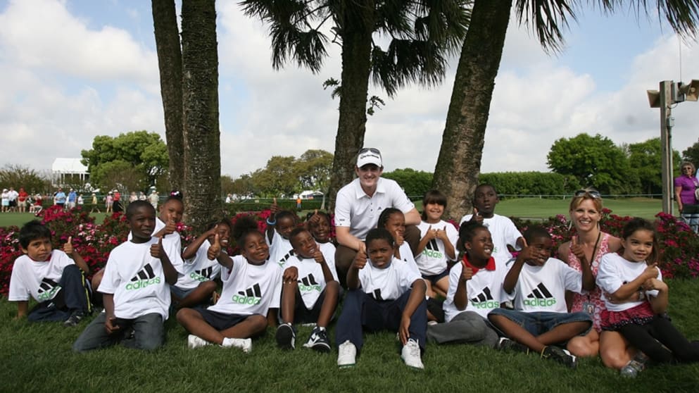 Justin and Kate Rose with children from the Blessings in a Backpack initiative