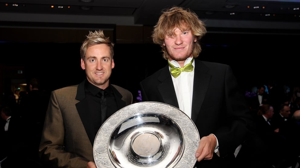 Ian Poulter presents the Rookie of the Year award to Chris Wood