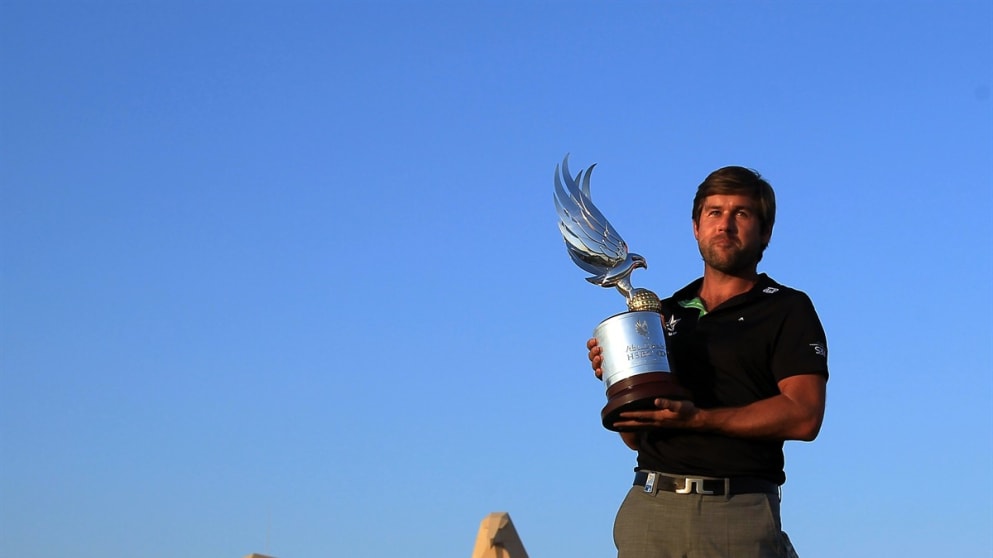 Two birds with one Rock: Robert Rock with the Falcon trophy in front of the famous clubhouse