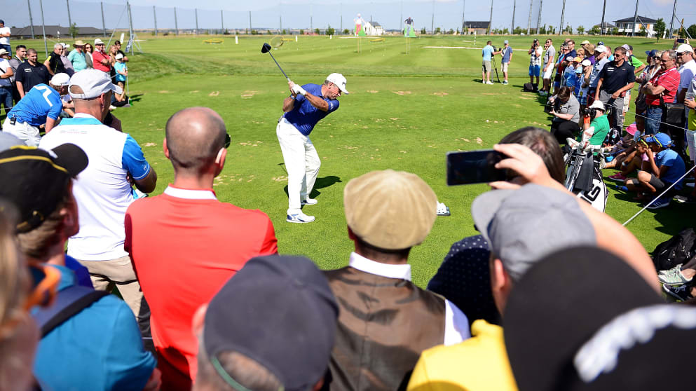 Lee Westwood drives the ball during a clinic in Prague