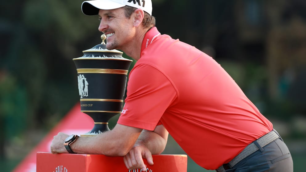 Justin Rose celebrates  after finishing 14 under to win the WGC - HSBC Champions