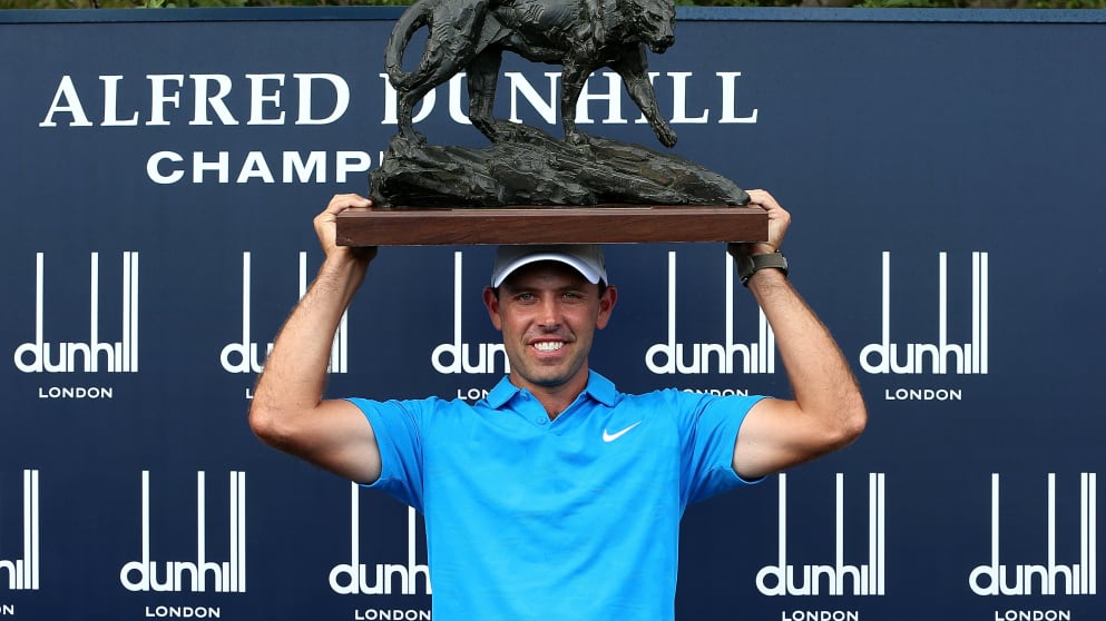 Charl Schwartzel - lifts the Alfred Dunhill Championship trophy for the fourth time