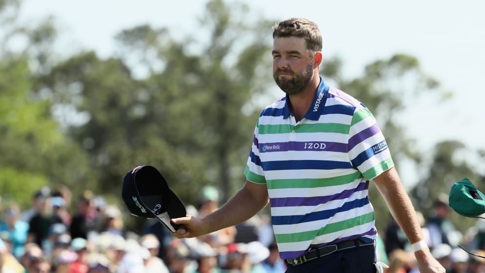 Marc Leishman of Australia walks off the 18th green