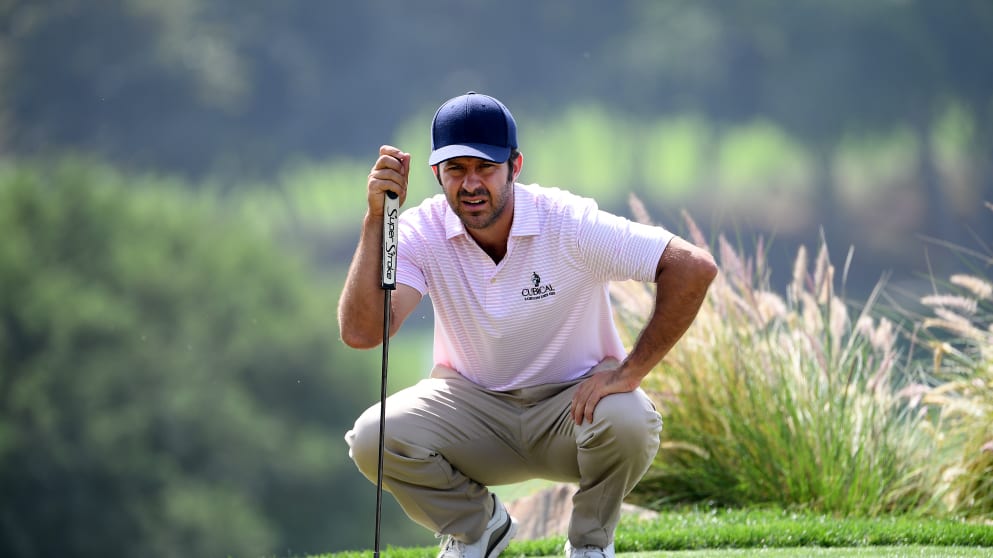 Jorge Campillo of Spain lines up a putt on the 17th green