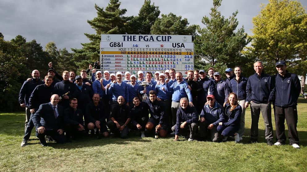 The victorious GB&I team pose with the trophy and Foxhills staff after the singles matches on the final day of the 28th PGA Cup at Foxhills Golf Course