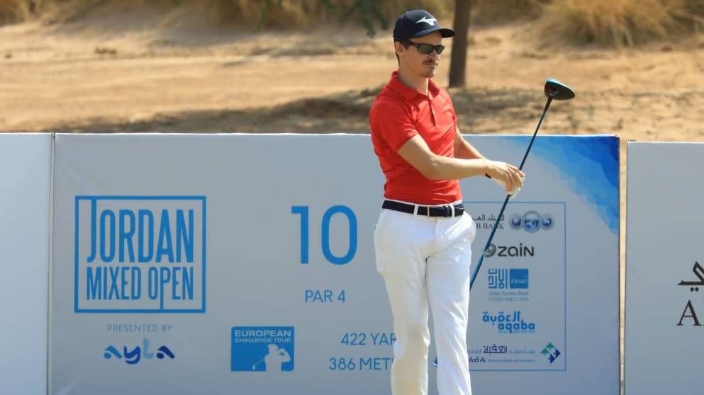 Daan Huizing watches his tee shot during the second round of the Jordan Mixed Open