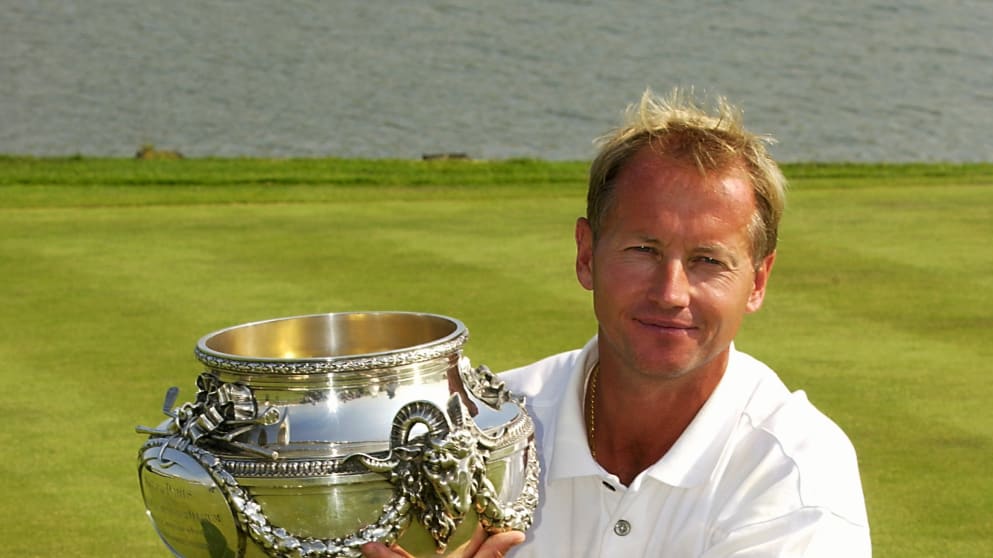 Philip Golding lifts the 2003 Open de France trophy