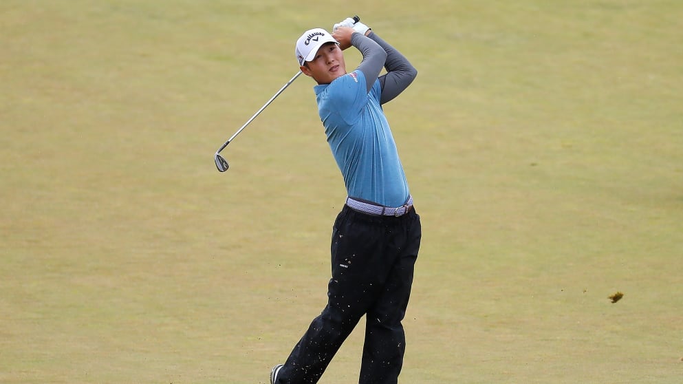 Danny Lee of New Zealand hits his 2nd shot on the 5th hole