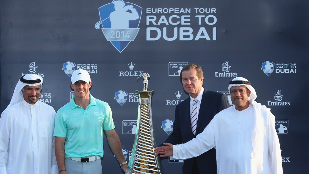 Rory McIlroy receives the Race to Dubai trophy from HE Saeed Harib, Secretary General of Dubai Sports Council, (far left), George O'Grady, and Yousuf Kazim, General Manger of Jumeirah Golf Estates, (far right) 