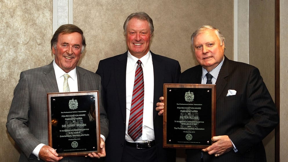 Peter Alliss recioeves his PGA Recognition Award from Sir Terry Wogan and PGA Captain Jim Farmer
