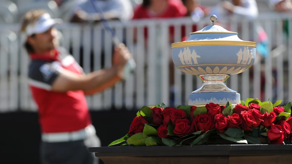 The Walter Hagen Trophy is displayed at the first hole as Victor Dubuisson sets off