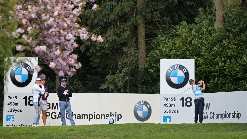 Wentworth Scholar and Bernard Gallacher Junior Trophy winner Bernard Gallacher Daniel Stafford tees of in the Future Champions Challenge under the watchful eye of Paul McGinley, Charley Hull and India Clyburn