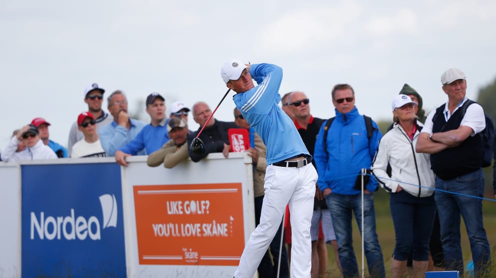 The eighteen year old amateur star Marcus Kinhult tees off on the third