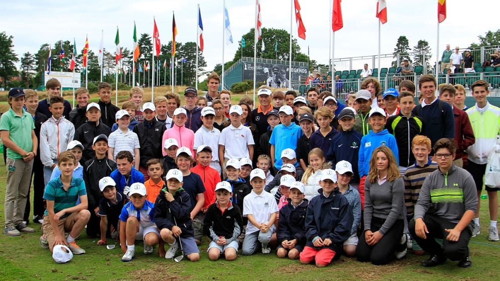 Bernhard Langer conducting a kids' coaching clinic at Sunningdale GC ahead of The Senior Open Presented by Rolex