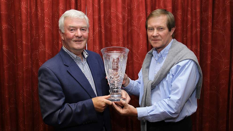 George O'Grady presents Royal Portrush GC Captain John Moss with an engraved Waterford Crystal vase