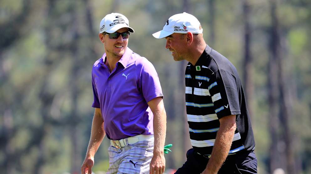  Jonas Blixt  and Thomas Bjorn walk off the third green 