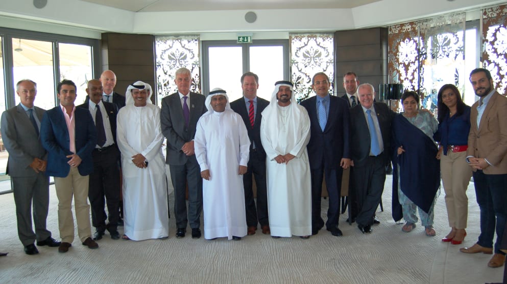 Mohamed Juma Buamaim, vice chairman and CEO of golf in DUBAi, with representatives of Omega Dubai Desert Classic sponsors at Emirates Golf Club
