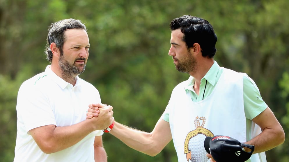 David Dixon - shakes hands with his caddie after shooting a third round 67 at the Trophee Hassan II