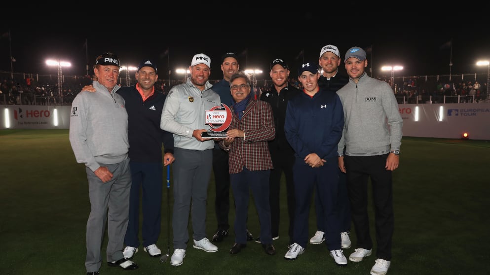 Lee Westwood is presented with the Hero Challenge trophy by Pawan Munjal, Managing Director of Hero MotoCorp