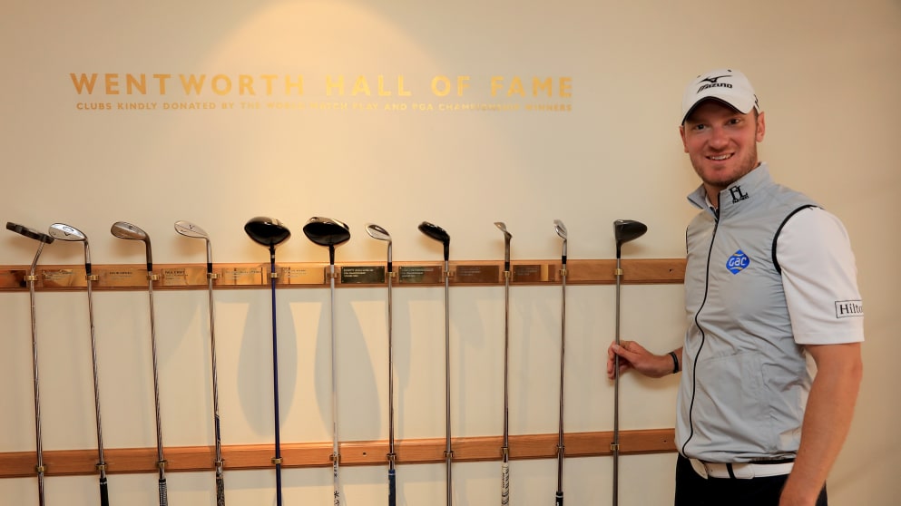 Chris Wood presenting a Mizuno 3 wood he used to the Wentworth Hall of Fame