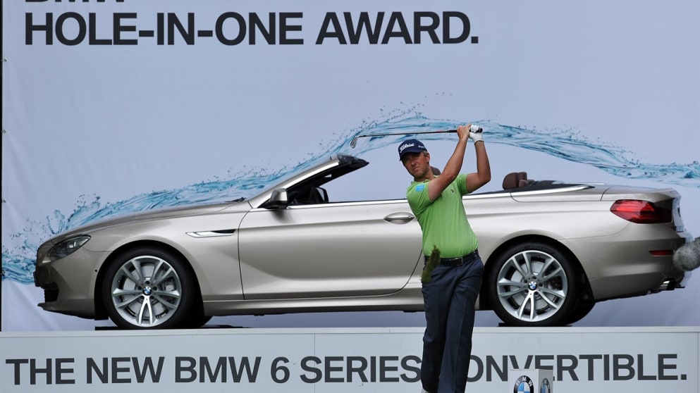 Mark Foster of England plays his tee shot on the 17th