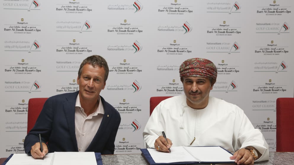 Mark Kirk, General Manager of Shangri-La Barr al Jissah Resort and Hasan Shaban, a Deputy General Manager at the National Bank of Oman, at the signing ceremony for the Premium Sponsor for the National Bank of Oman Golf Classic
