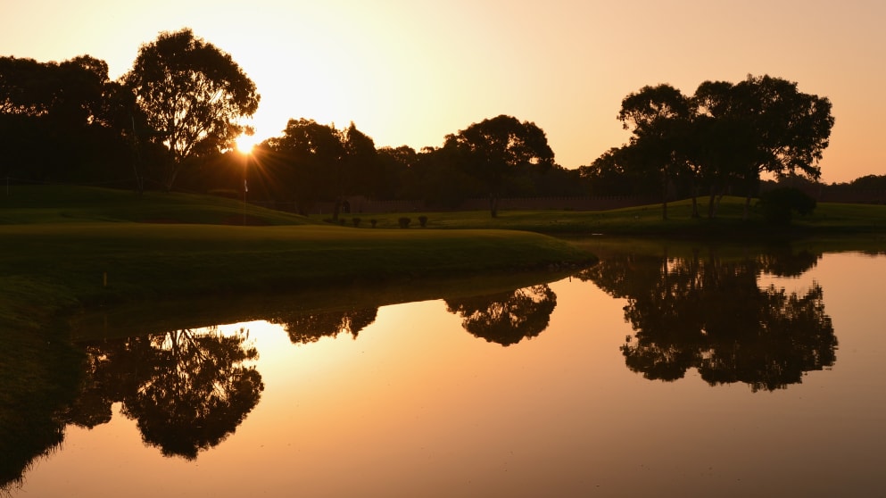 The sun rises over the 12th hole before the start of the third round 