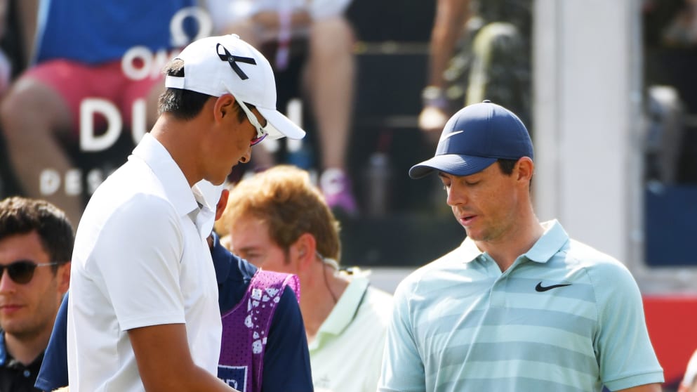 Rory McIlroy and Li Haotong