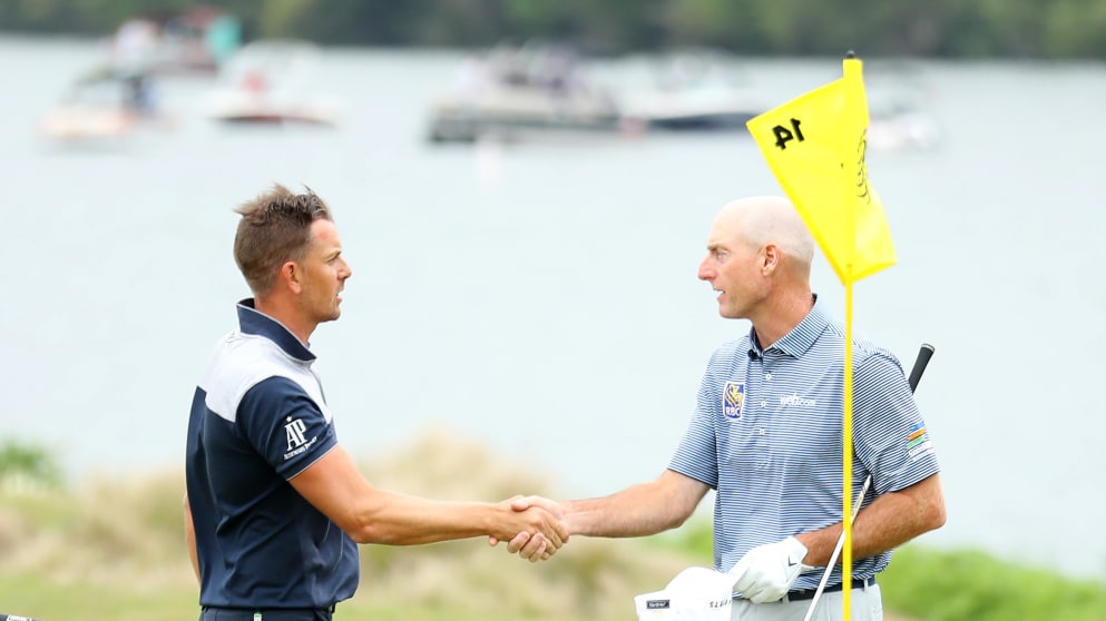 Henrik Stenson shakes hands with Jim Furyk