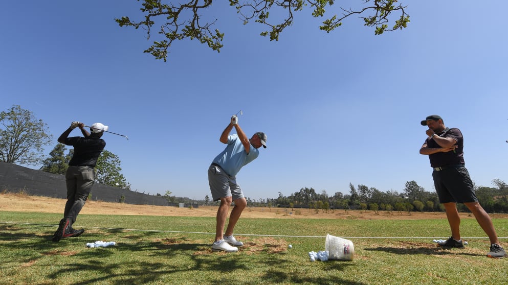 Thomas Bjorn plays a shot on the driving range