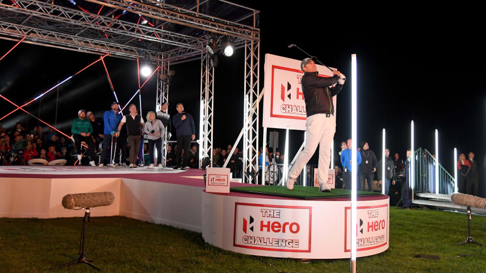 Shane Warne hits his tee shot during the 'Hero Challenge' 