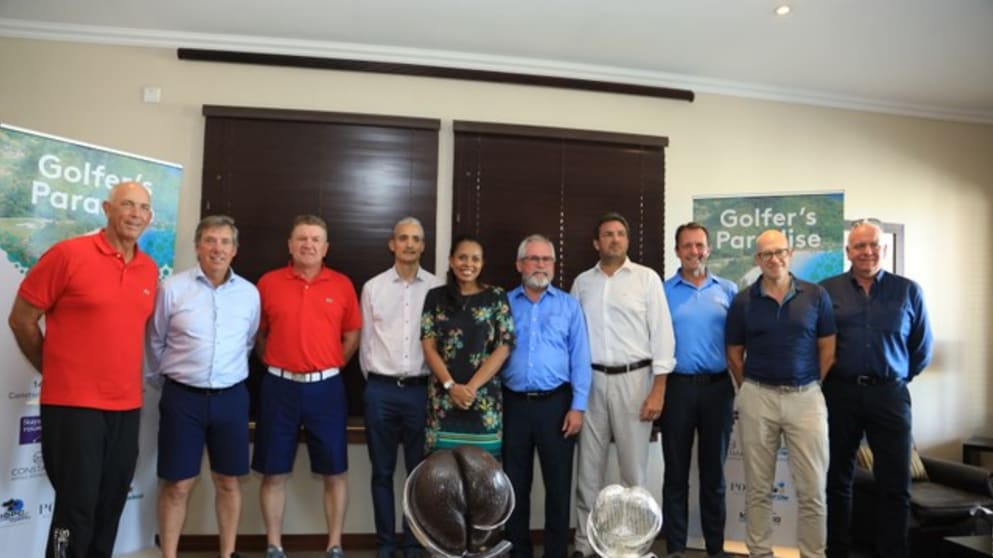 Tom Lehman, Barry Lane and Paul Broadhurst with the welcoming party at Mahe Airport