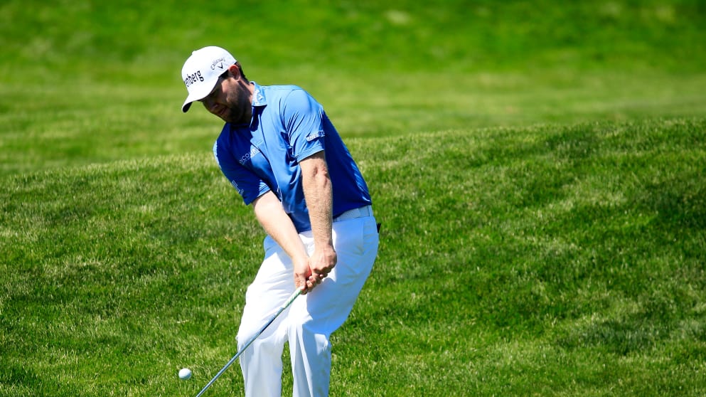 Branden Grace chipping on the fourth hole