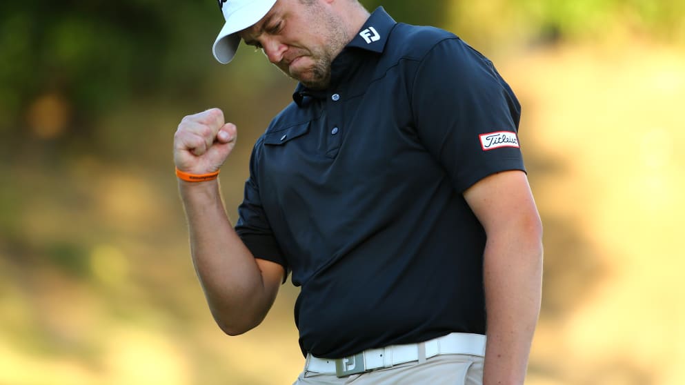 An emotional Matthew Southgate of England reacts to securing his tour card during the final round of the European Tour Qualifying School Final at PGA Catalunya 