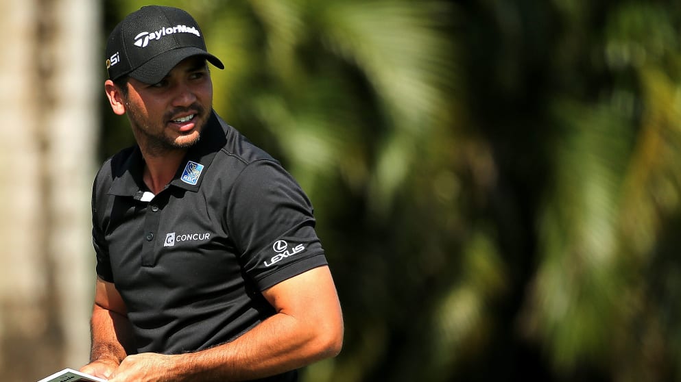 Jason Day of Australia hits balls on the range during a practice round